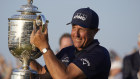 Phil Mickelson holds the Wanamaker Trophy after winning the 2021 PGA Championship.