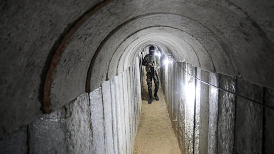 An armed guard inside one of the tunnels on the Gaza-Israeli border.