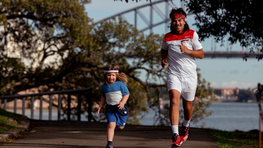 Marathon runner Christian Gillies, with his son Minolo will run his 100th marathon today.