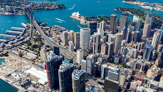 A high, steep shot from over the International Towers at Barangaroo, facing north over the Rocks and Circular Quay.