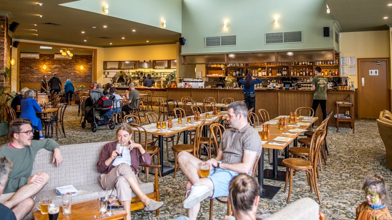 A 172-year-old pub has been restored with kitsch couches and patterned carpets