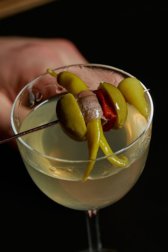 The house martini garnished with a gilda.