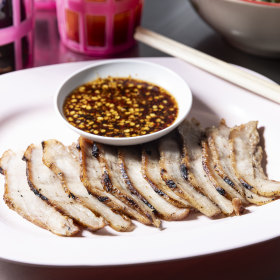 Pork neck and dipping sauce.