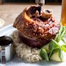 Pork knuckle with sauerkraut, hot mustard, mash and Dunkel-Bier sauce is on the Christmas menu at Hofbräuhaus.