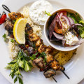Kalamaki (mixed skewers served over rice) at Tsindos Greek restaurant in Melbourne CBD.