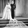 How does Meghan's gown compare to royal wedding dresses of the past? ​