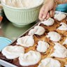 Preparing cinnamon buns with maple whipped cream at Ard, Stanmore.