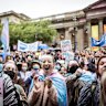 Transgender rights activists demonstrate outside the Victorian parliament in 2022.