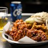 Fried chicken washed down with Cass beer at Seven Star Pocha in Koreatown. 
