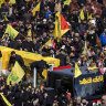 The funeral procession for former Hezbollah leaders, Hassan Nasrallah, front, and Hashem Safieddine, circles around the track at the Sports City Stadium on February 23, 2025 in Beirut, Lebanon. Tens of thousands of people have gathered in Beirut to attend the funeral of Hezbollah’s former leader, Hassan Nasrallah, nearly five months after he was killed in an Israeli airstrike on a southern suburb of the Lebanese capital. Nasrallah founded and led the Shi’ite Muslim group for 30 years, through decades of conflict with Israel and became one of the most prominent Arab figures in generations. (Photo by Daniel Carde/Getty Images)
