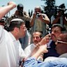 June 2000: Ben-Gvir raises his fist at Palestinian guards as Israelis march through traditionally Arab East Jerusalem.
