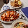 Baked vodka pasta and other dishes at Gambino’s rooftop bar.