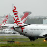 Virgin Australia cuts 90 per cent of flights, stands down 8000 workers