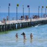 Melbourne sweats on hottest day of summer, firefighters on high alert in the north