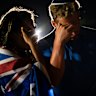 A couple mourns at a candlelight vigil in the days after the attack at Bondi. 