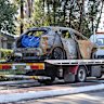 A car is removed from Welfare Ave North in Beverly Hills after a dead body of a woman was found inside. 