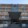 Victorian hospitals reopen coronavirus wards amid record demand