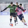Cavalry FC’s Tobias Warschewski, left, fights off Atletico Ottawa’s Gabriel Mendes Antinoro in the Canadian Premier League finals soccer match action in Ottawa.