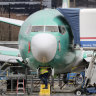 Boeing restarts production of the still-grounded 737 MAX as financial distress hovers