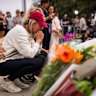 Jodie Gien visits the memorial at Bondi Pavilion, two days after the mass shooting at Bondi Beach.