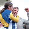 Jockey Rachel King and trainer Bjorn Baker celebrate.
