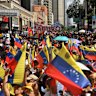 Pro-government supporters attend a rally a day after the capture of Nicolas Maduro.