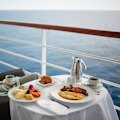 Breakfast with a sea breeze on Oceania.