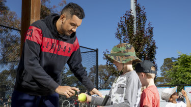 Kyrgios signing autographs at the recent Canberra International.