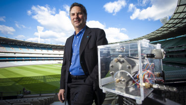 CSIRO CEO Larry Marshall with a mini-hydrogen fuel cell.  