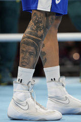 A tattoo of Muhammad Ali on Harry Garside’s leg.