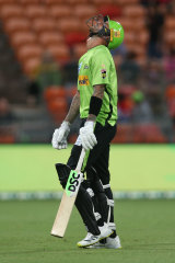 Alex Hales of the Thunder walks off.