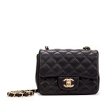 Tess would like a classic black Chanel handbag.