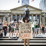 The protestors gathered at the State Library. 