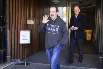 Minister for Tourism, Sports and Major Events Martin Pakula (left) leaves Saturday’s meeting.