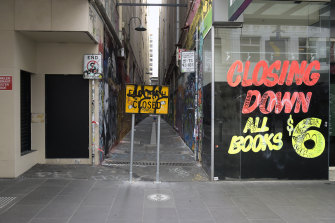 A closing-down sign outside a book store during a lockdown in Melbourne.