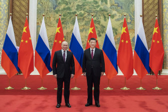 Chinese President Xi Jinping, right, holds talks with Russian President Vladimir Putin at the Diaoyutai State Guesthouse in Beijing.