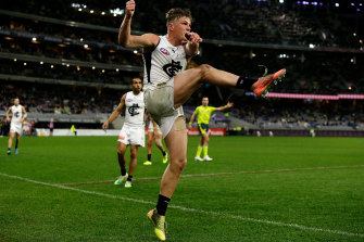 Last gasp: Jack Newnes takes his kick after the siren to seal the win over Fremantle.