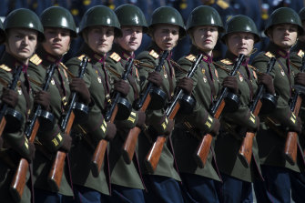 Russian Army officers dressed in Red Army World War II uniforms and holding PPSh-41 sub-machineguns march along Red Square during a rehearsal on May 7 last year for the Victory Day military parade in Moscow.