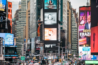 Ads in New York’s Times Square promoting the nonfungible token conference NFT.NYC. 