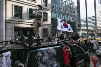 Bae In-kyu, head of Man on Solidarity, one of South Korea’s most active anti-feminist groups, leads a rally in Seoul, December 12.