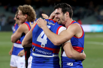 Bontempelli and his predecessor Easton Wood embrace after the preliminary final win.