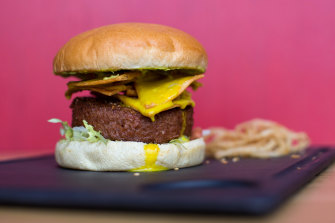 A burger made with a Beyond Meat  plant-based burger patty.