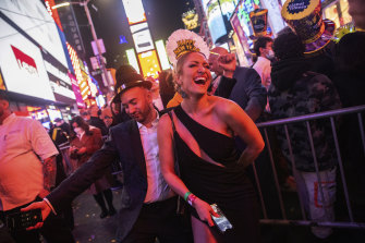 Revellers celebrate the new year in Times Square on December 31.