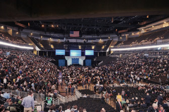 Attendees find their seats during the Berkshire Hathaway annual meeting in Omaha on Saturday.