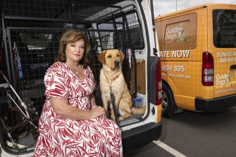 Guide Dogs Victoria CEO Karen Hayes with Ari the guide dog on Sunday.