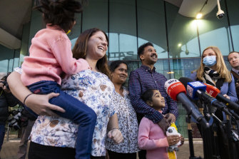 The Murugappan family speak to the media outside of Perth Airport this morning.