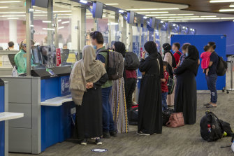 People arrive in Australia from Afghanistan last month.