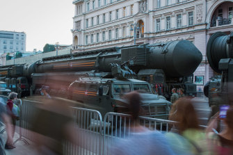 An intercontinental ballistic missile is driven along a Moscow street during rehearsals for Victory Day in 2020.