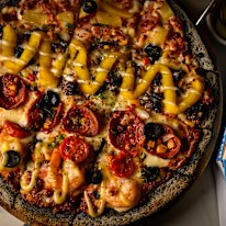 The Fantastic Four pizza at Pizza Monster made with black rice.