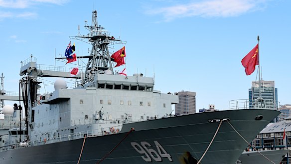 The Australian and Chinese flags are seen on board a Chinese warship after it arrived at Garden Island Naval Base in Sydney last month